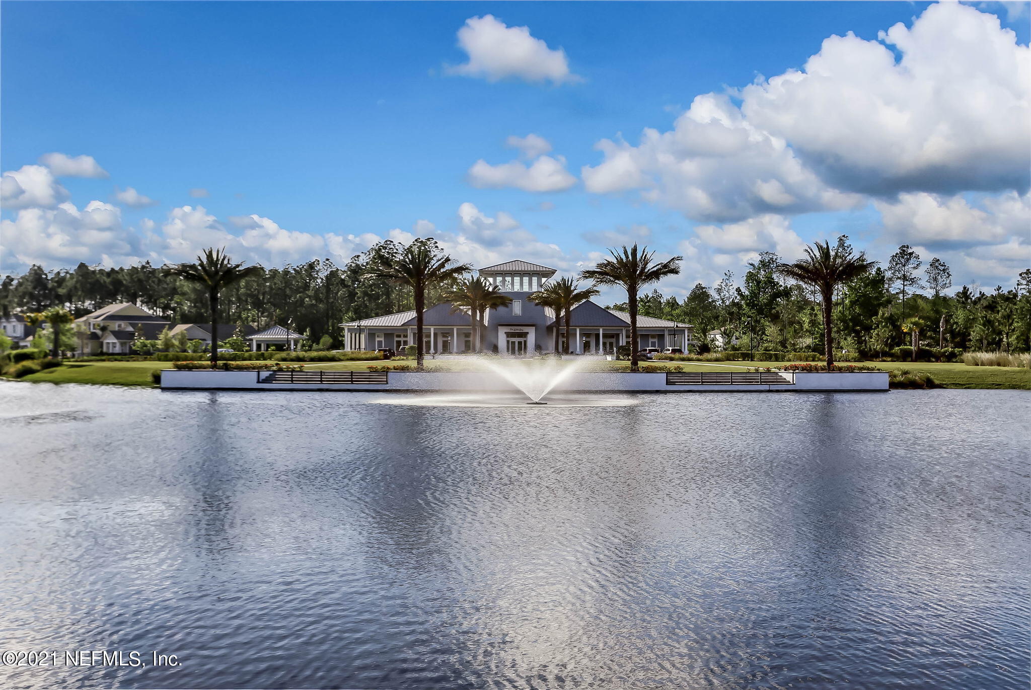 33 Adler Place St. Johns, FL 32259 - Photo 76 of 82 a view of a swimming pool and trees in the background