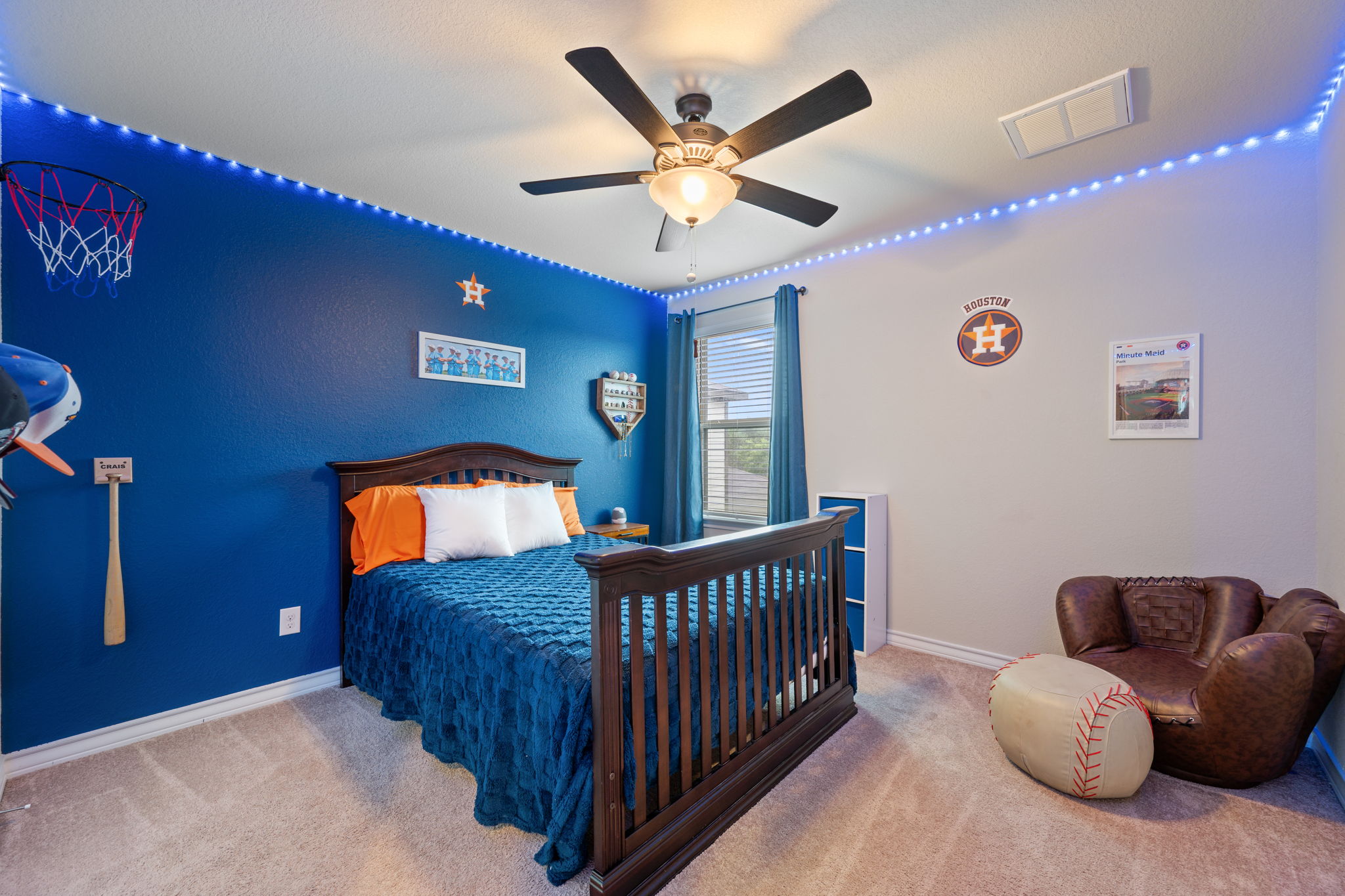 409 Limestone Road Liberty Hill, TX 78642 - Photo 29 of 35 a bedroom with furniture and a large window