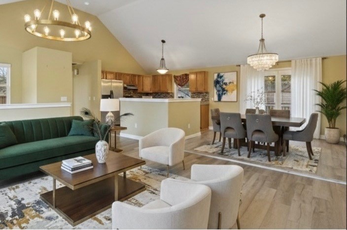 442 Lake Avenue Worcester, MA 01604 - Photo 3 of 14 a living room with furniture a dining table and a chandelier