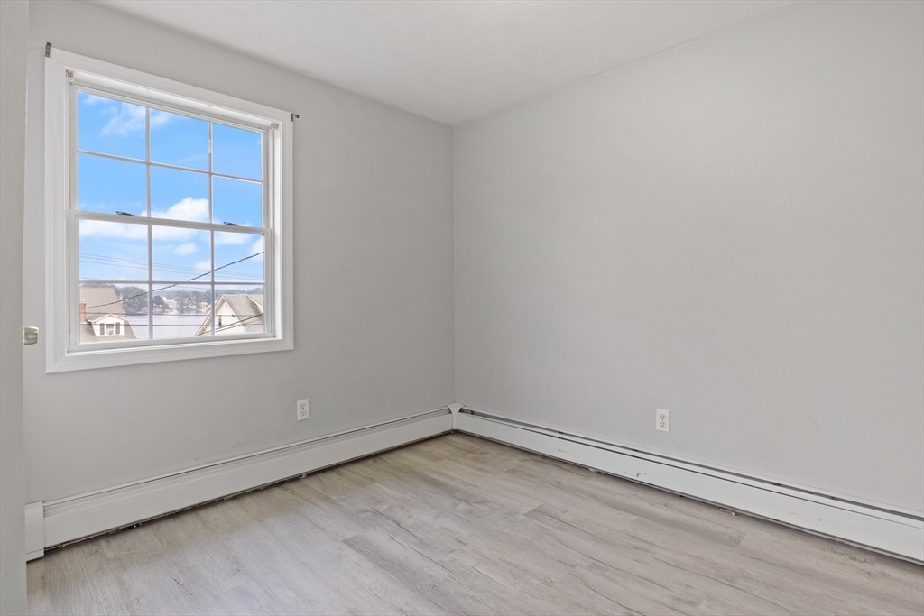 442 Lake Avenue Worcester, MA 01604 - Photo 8 of 14 an empty room with a window