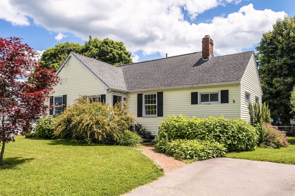 29 Doris Drive Weymouth, MA 02191 - Photo 1 of 18 a front view of a house with a garden