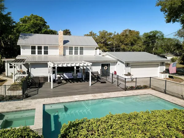 an arial view of a house with garden