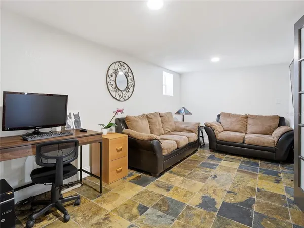 a view of entryway and workspace