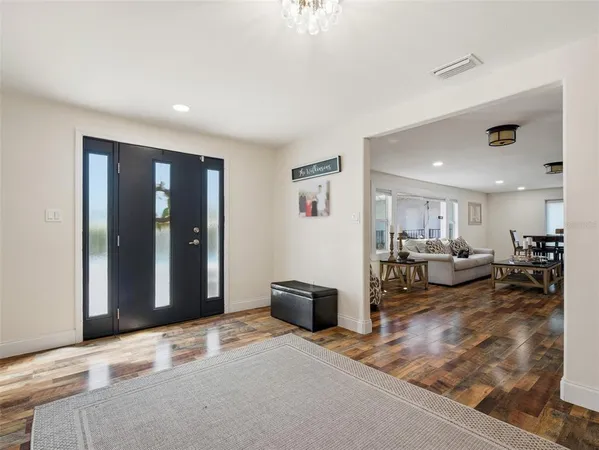a living room with furniture and a table