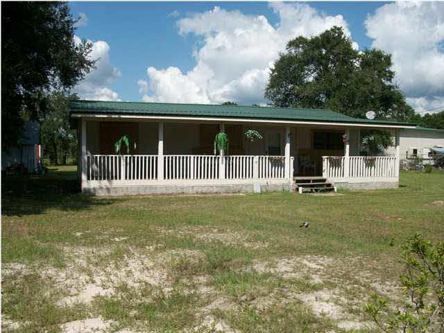 11380 6 Pack Road Milton, FL 32583 - Photo 1 of 22 Nice country setting, Huge front covered porch.
