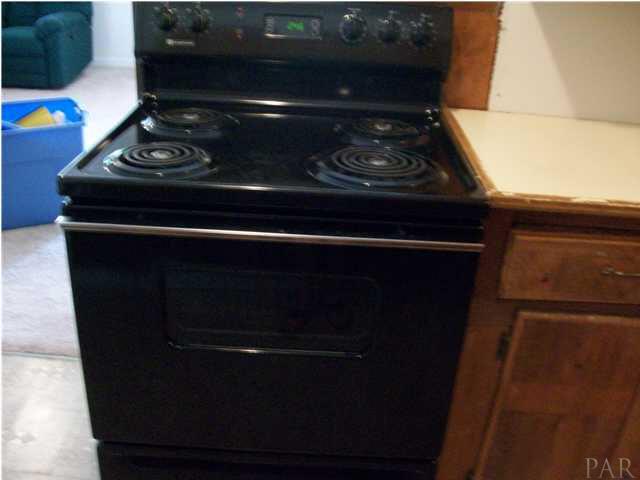 11380 6 Pack Road Milton, FL 32583 - Photo 11 of 22 New electric stove.