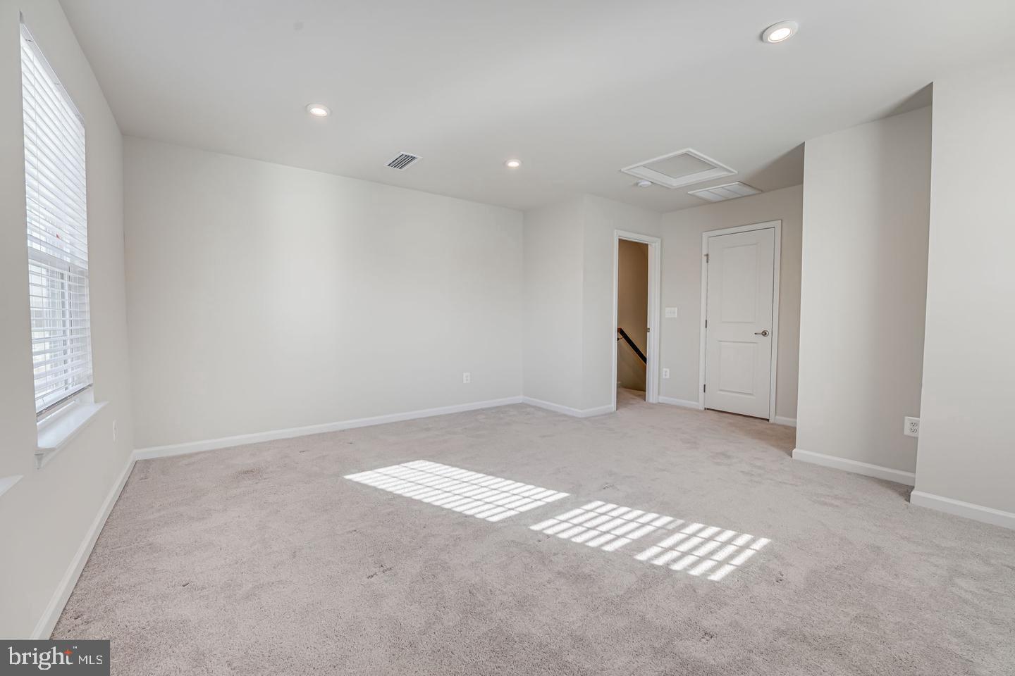 18339 Reaper Hl Court Triangle, VA 22172 - Photo 16 of 34 a view of an empty room with a window