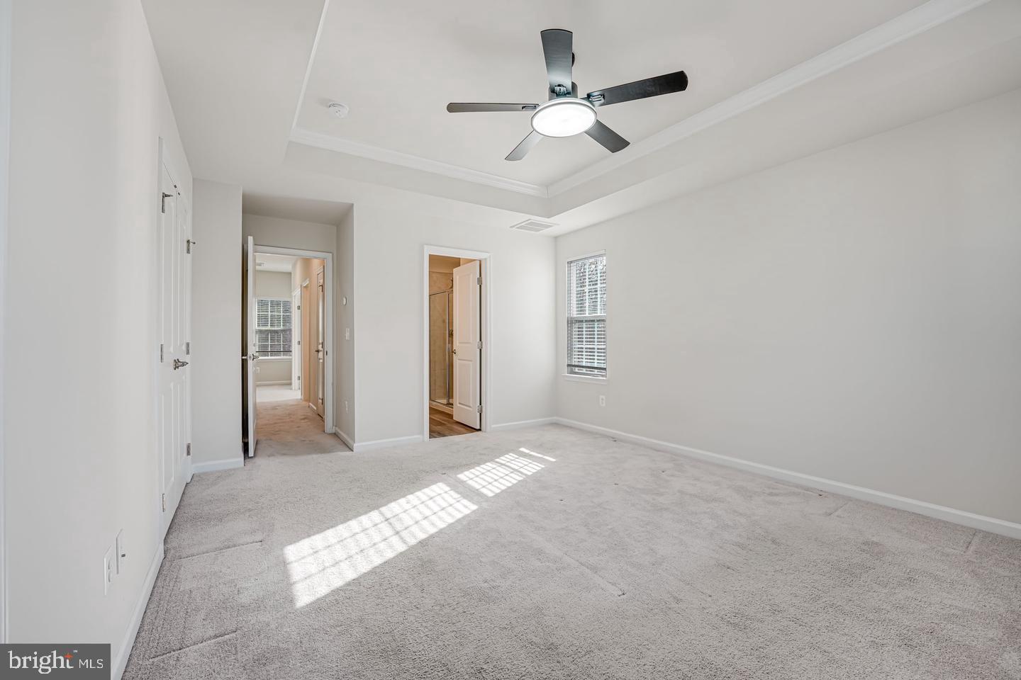 18339 Reaper Hl Court Triangle, VA 22172 - Photo 20 of 34 an empty room with chandelier fan