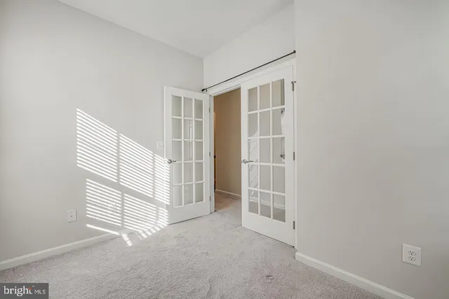 a view of a livingroom with stairs