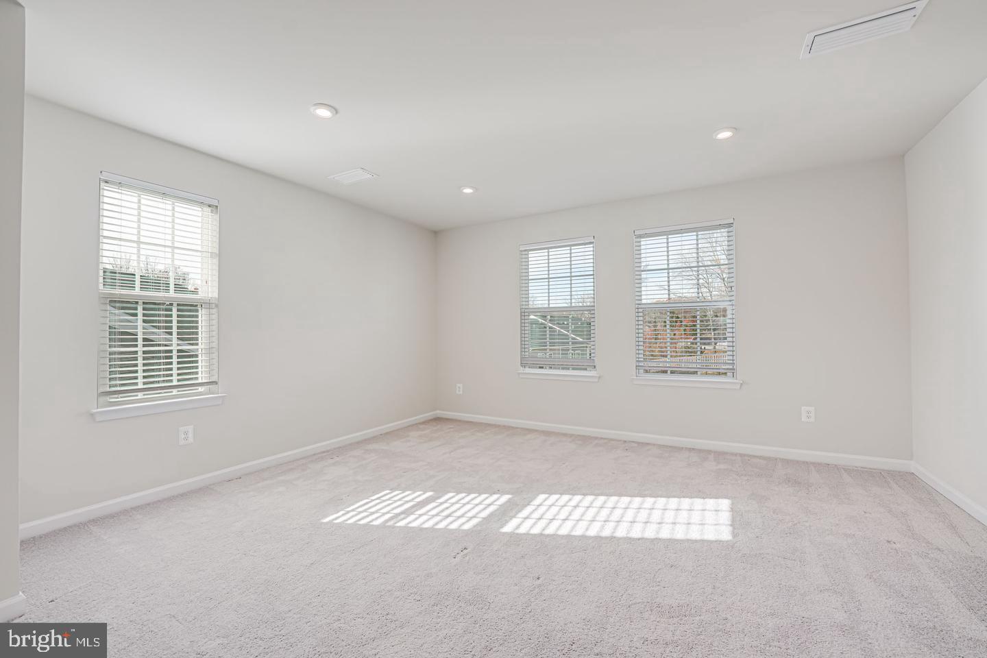 18339 Reaper Hl Court Triangle, VA 22172 - Photo 29 of 34 an empty room with windows
