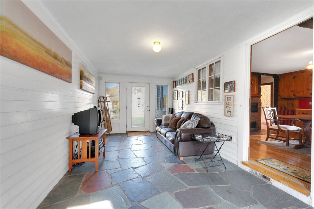 114 Summer Street Maynard, MA 01754 - Photo 17 of 32 a living room with furniture and a flat screen tv