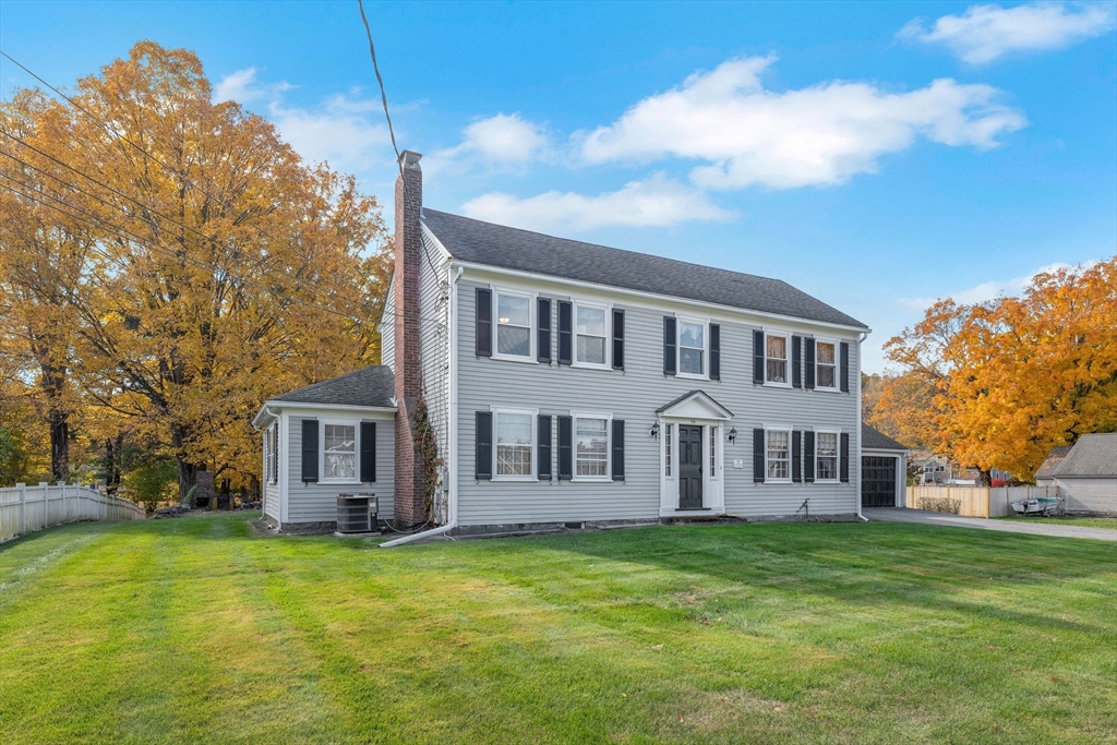 114 Summer Street Maynard, MA 01754 - Photo 19 of 32 a view of a house with a backyard