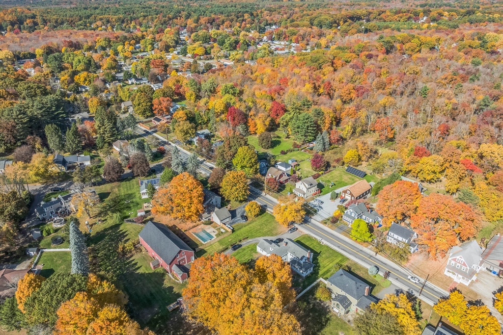 114 Summer Street Maynard, MA 01754 - Photo 26 of 32 an aerial view of residential houses with outdoor space