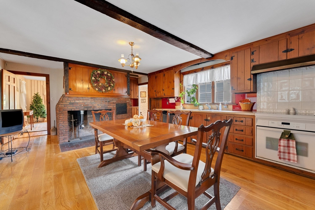 114 Summer Street Maynard, MA 01754 - Photo 29 of 32 a dining room with furniture and wooden floor