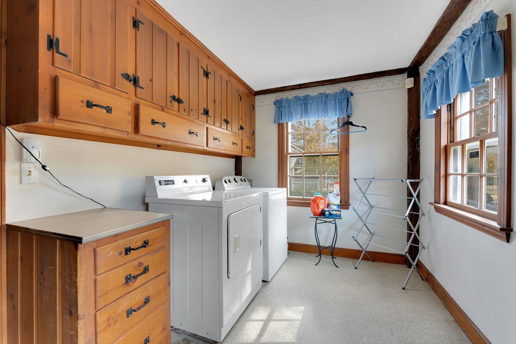 114 Summer Street Maynard, MA 01754 - Photo 30 of 32 a utility room with dryer and washer