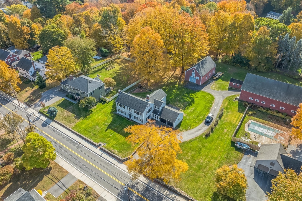 114 Summer Street Maynard, MA 01754 - Photo 6 of 32 an aerial view of a houses with swimming pool