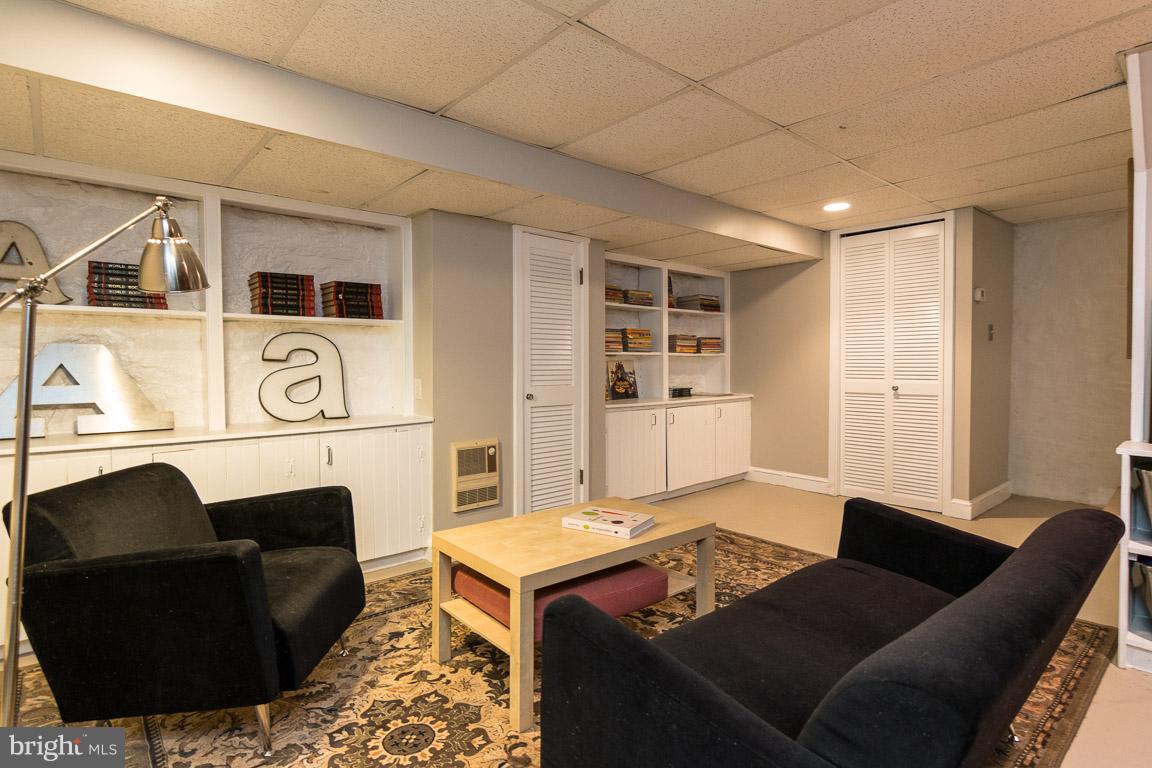 209 Oakdale Road Baltimore, MD 21210 - Photo 25 of 29 Finished lower level with built ins!