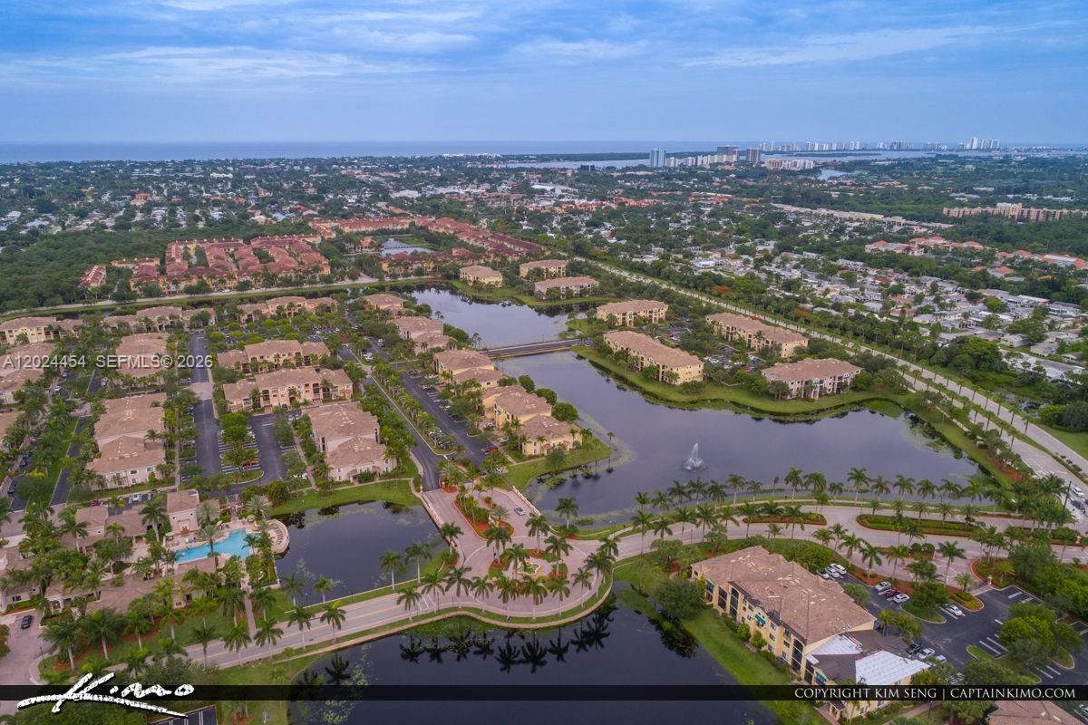 2727 Anzio Court, Unit 106 Palm Beach Gardens, FL 33410 - Photo 43 of 43 an aerial view of residential houses with outdoor space