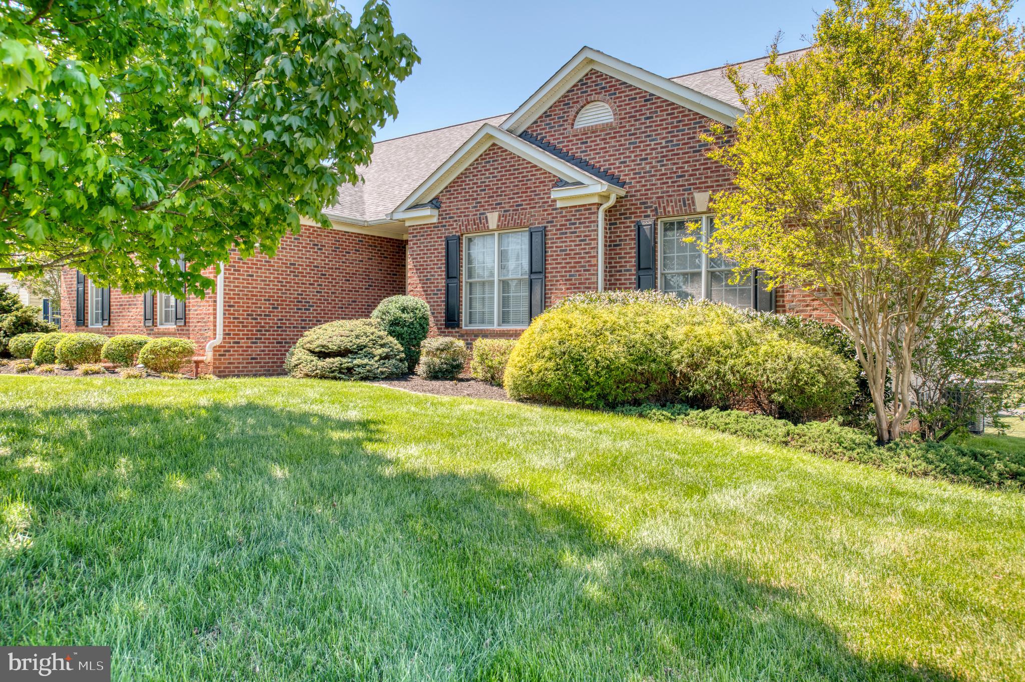 14308 South Hall Court Culpeper, VA 22701 - Photo 48 of 78 a front view of a house with a garden