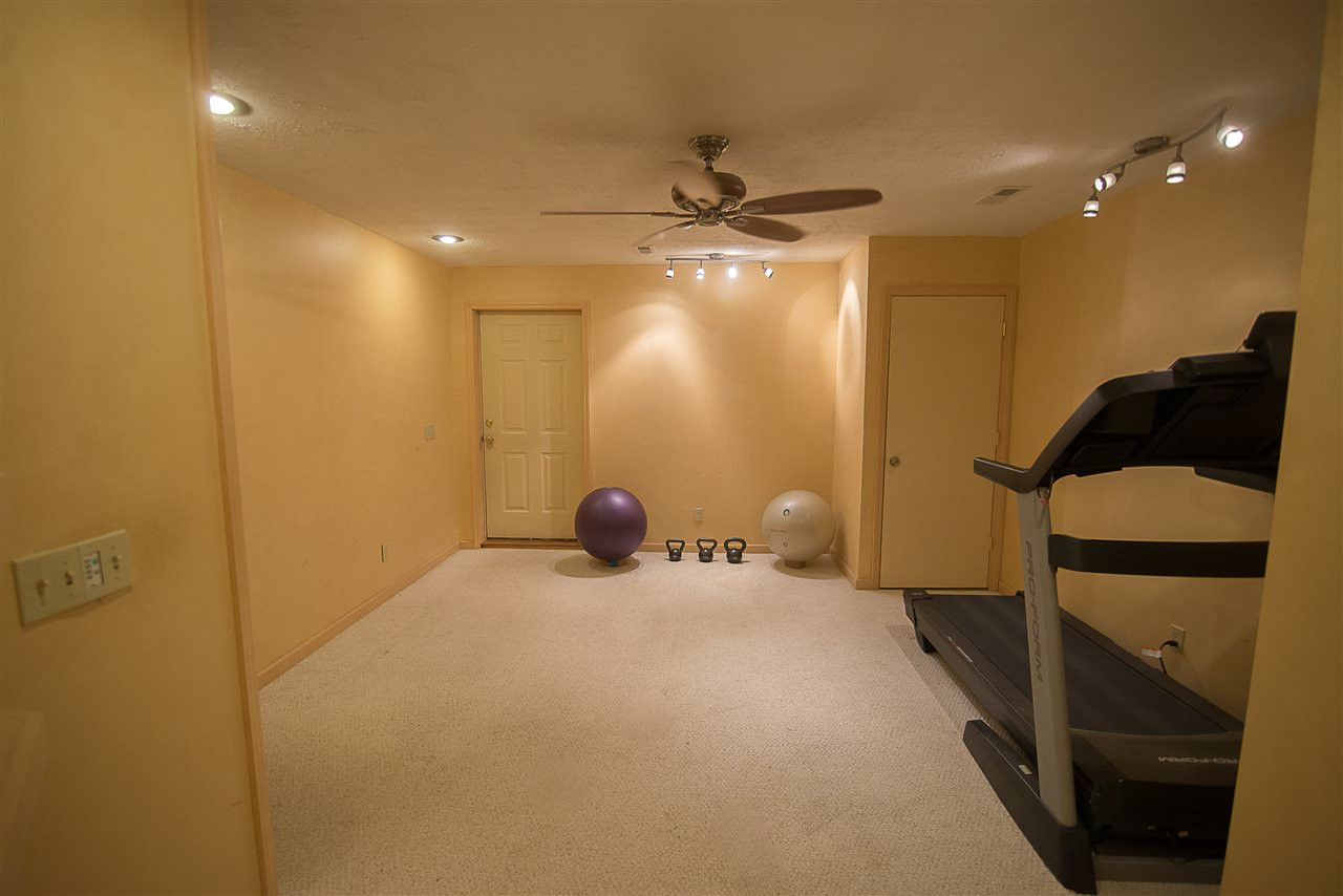 5204 Camfirth Way Raleigh, NC 27613 - Photo 19 of 21 Finished basement with TONS of storage! This areas makes a great rec/exercise room, media or bonus room! Basement
