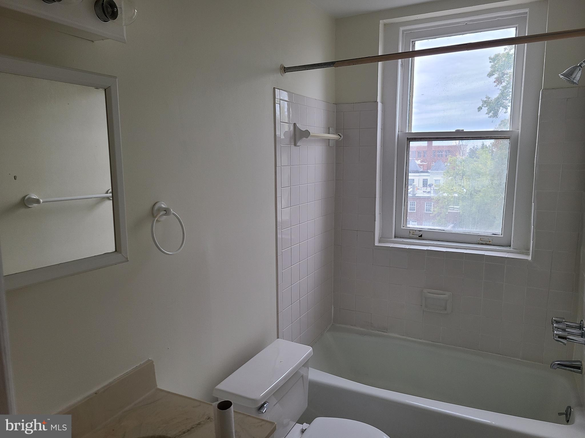 3420 16th Street Northwest, Unit 404 Washington, DC 20010 - Photo 11 of 11 Even the bath has a south facing window