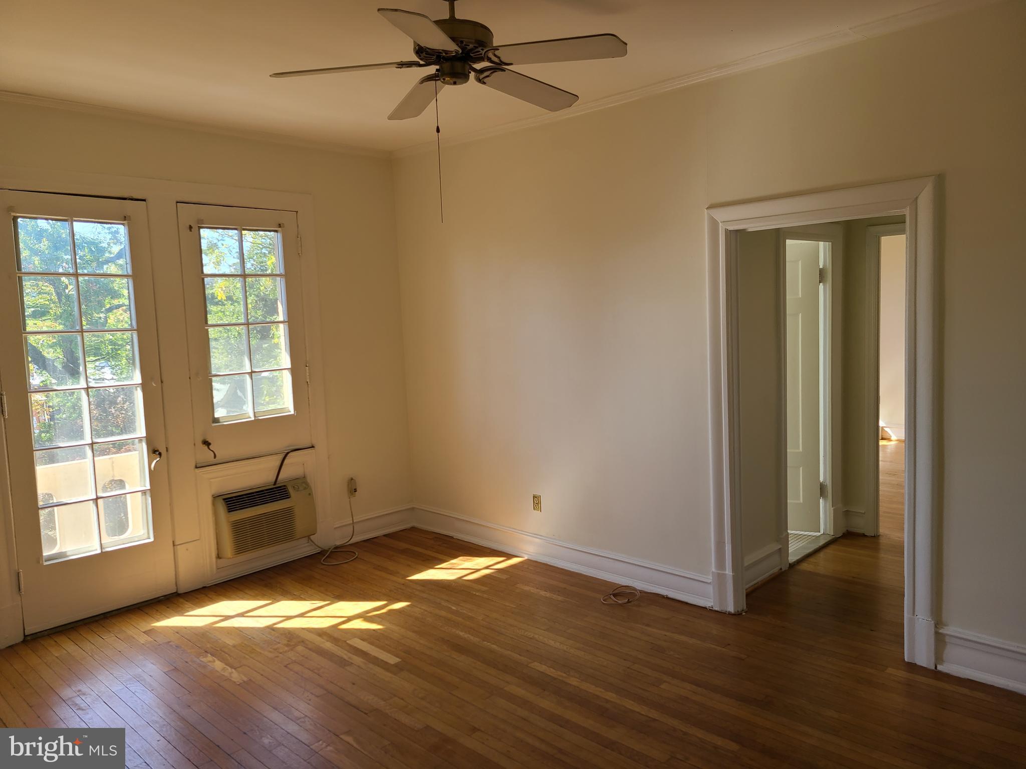 3420 16th Street Northwest, Unit 404 Washington, DC 20010 - Photo 2 of 11 Living room w/opens to balcony