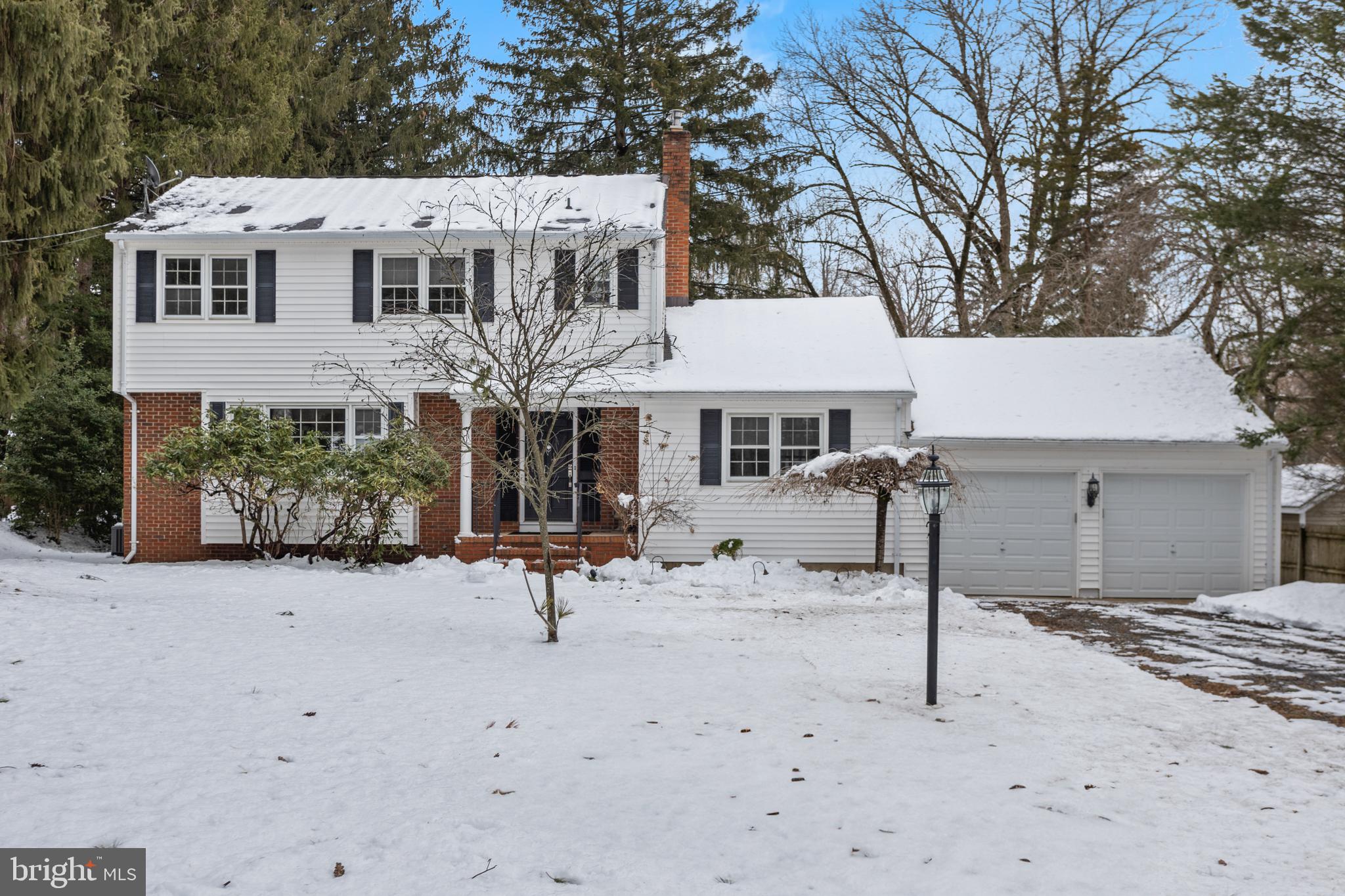 11 Mountain Vw Road Ewing, NJ 08628 - Photo 1 of 36 a front view of a house with a yard and garage