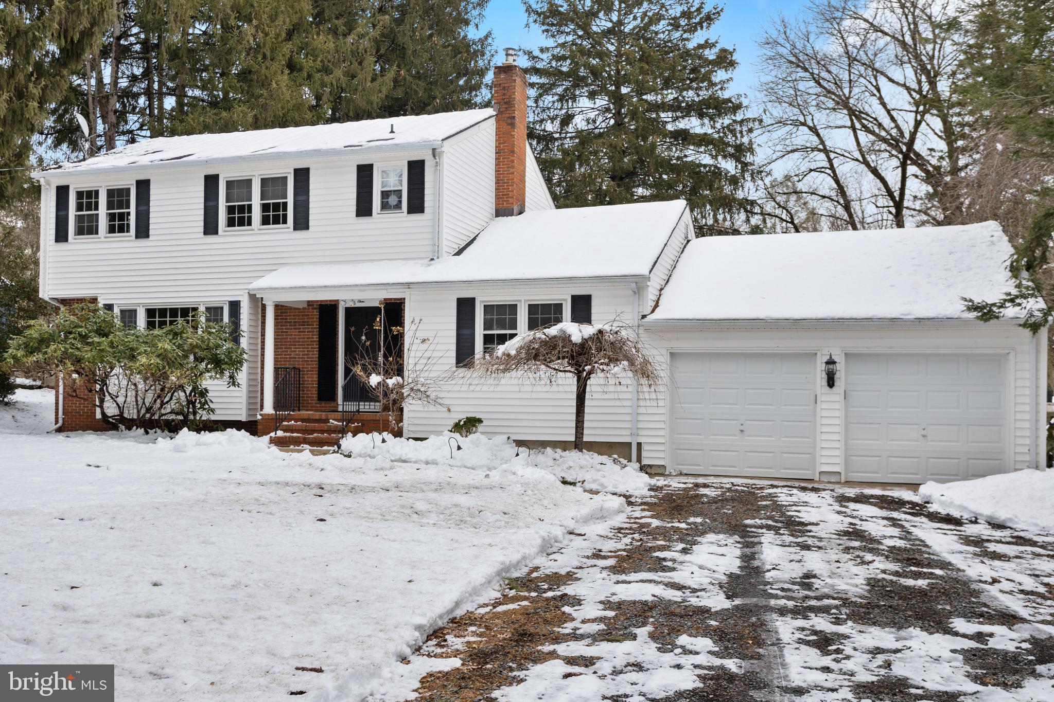 11 Mountain Vw Road Ewing, NJ 08628 - Photo 3 of 36 a front view of a house with a yard and garage
