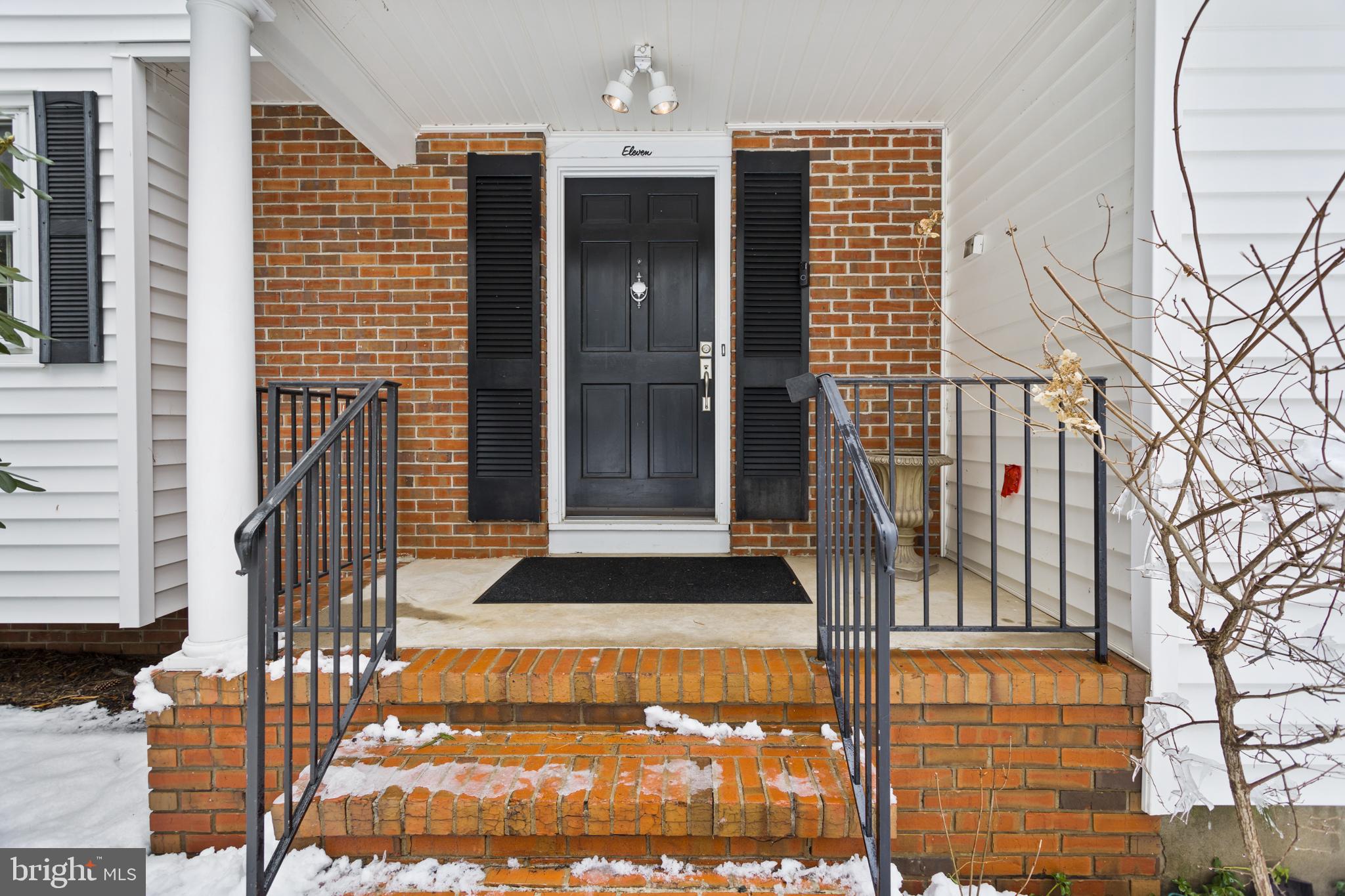 11 Mountain Vw Road Ewing, NJ 08628 - Photo 4 of 36 a front view of a house with a glass door
