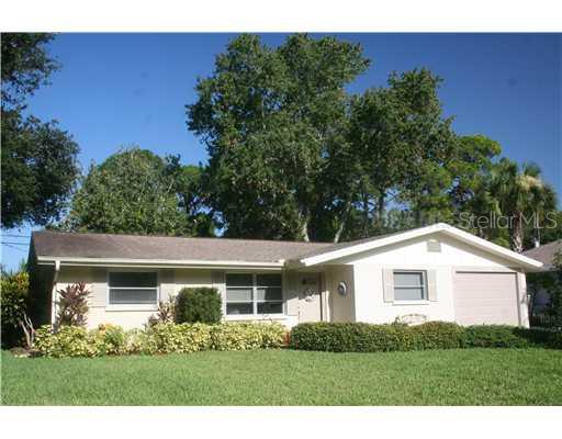 2566 Dawn Road Venice, FL 34293 - Photo 1 of 1 a front view of a house with a yard
