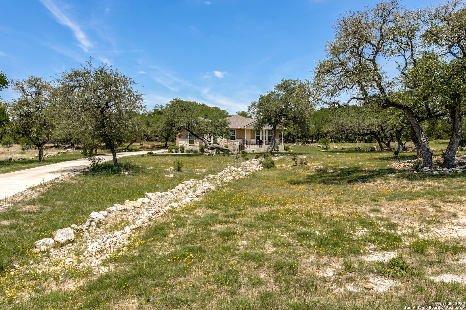1608 Lake Ridge Boulevard Canyon Lake, TX 78133 - Photo 1 of 1 a view of a lake with houses