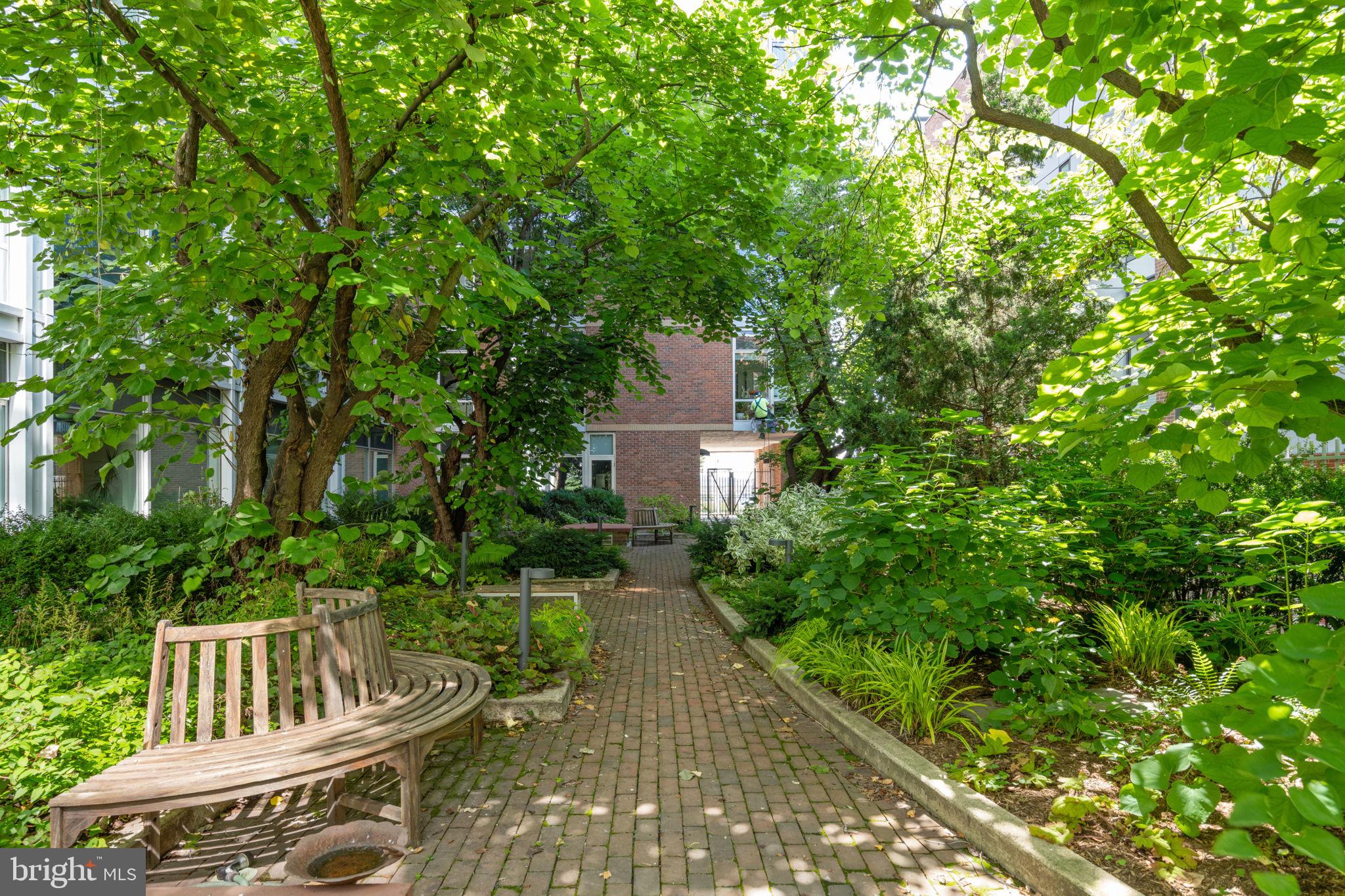 22 South Front Street, Unit 304 Philadelphia, PA 19106 - Photo 18 of 20 a view of house with backyard and sitting area