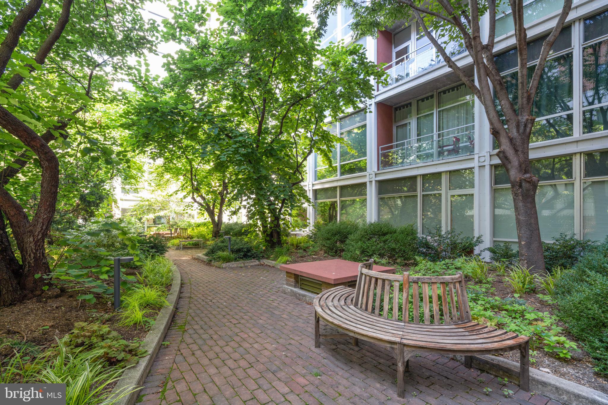 22 South Front Street, Unit 304 Philadelphia, PA 19106 - Photo 20 of 20 a view of a chair and table in backyard of the house