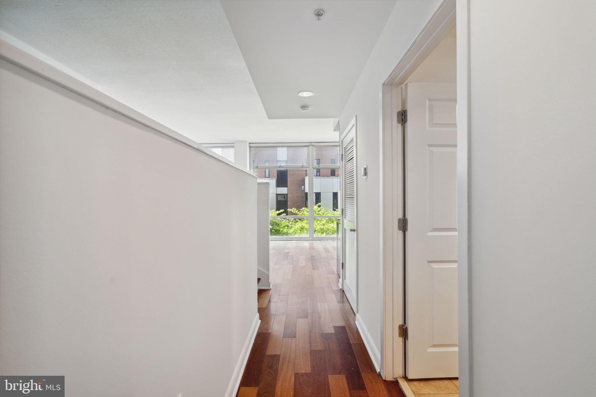 22 South Front Street, Unit 304 Philadelphia, PA 19106 - Photo 2 of 20 a view of hallway with wooden floor