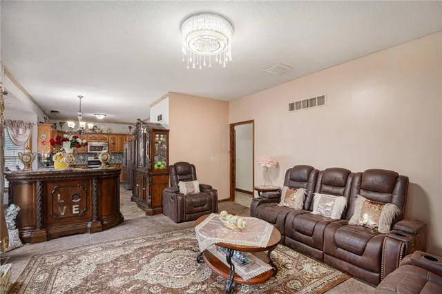 $428,000 | 4407 Southwest Briarbrook Drive, Lee's Summit, MO 64082