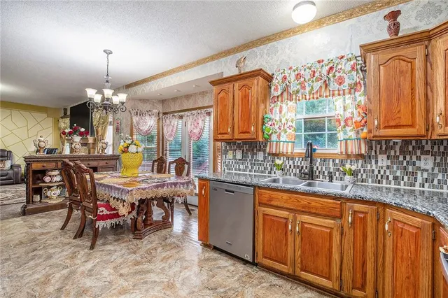 $428,000 | 4407 Southwest Briarbrook Drive, Lee's Summit, MO 64082