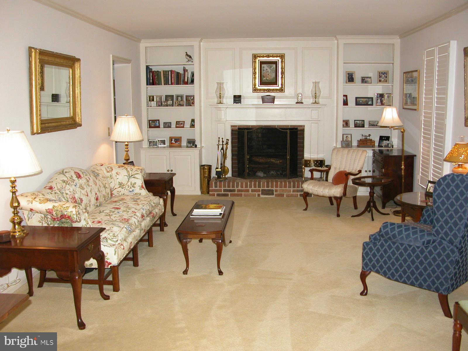 8111 Church Neck Road St. Michaels, MD 21663 - Photo 5 of 30 Living Room with wood burning fireplace