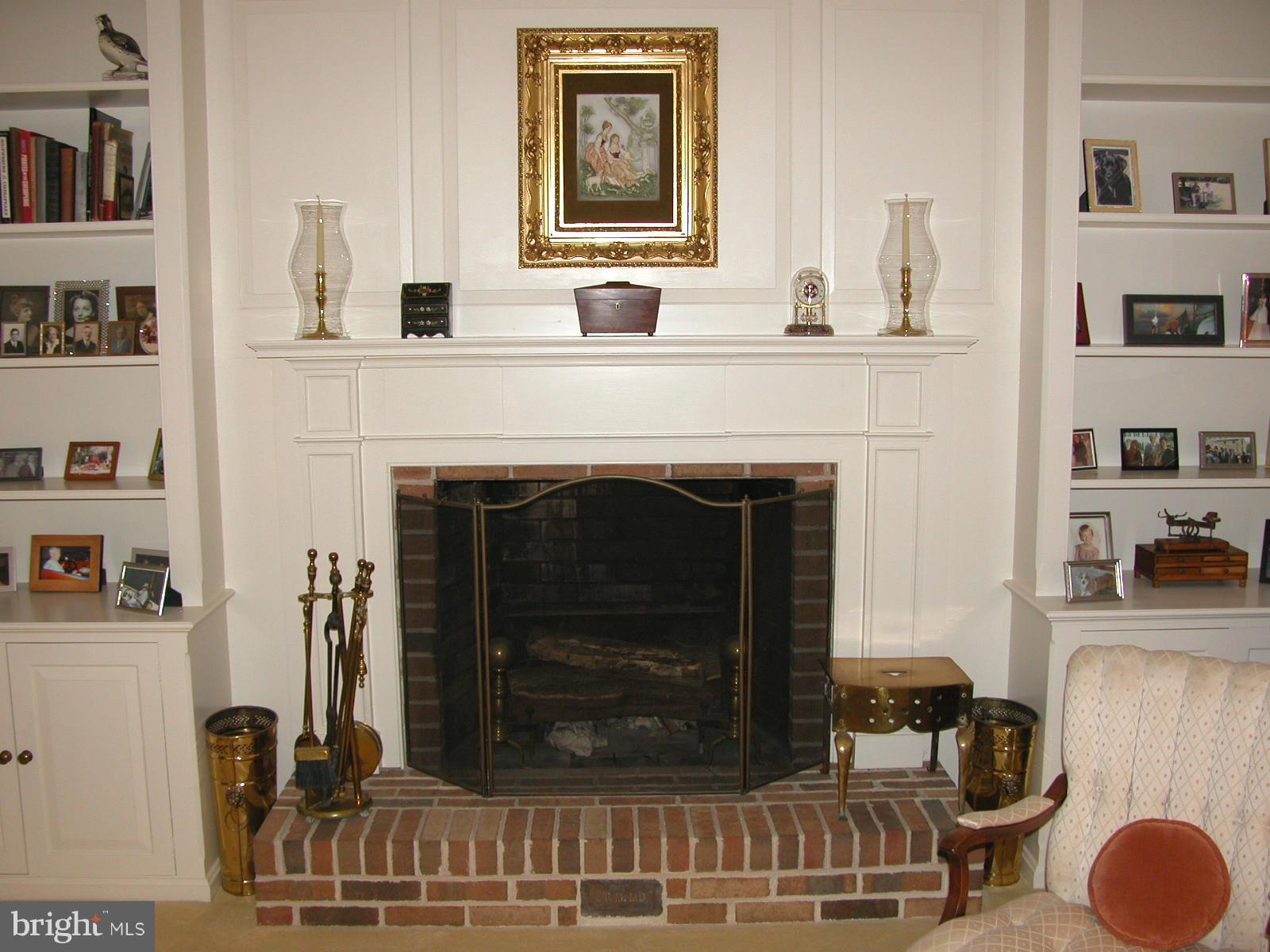 8111 Church Neck Road St. Michaels, MD 21663 - Photo 7 of 30 Mantle and book case built by Jim Mc Martin