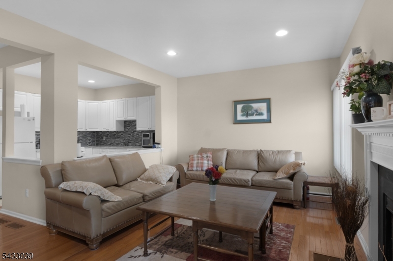 158 Autumn Ridge Road Morris Plains, NJ 07950 - Photo 6 of 26 a living room with furniture and a couch