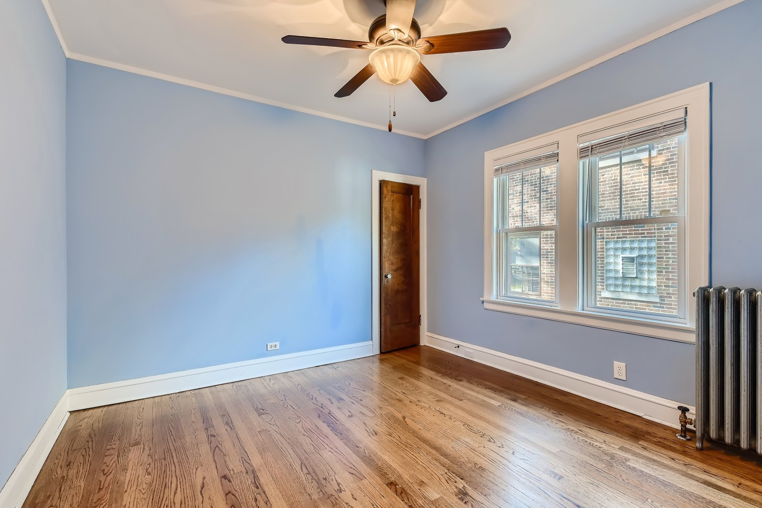 341 Nuttall Road Riverside, IL 60546 - Photo 11 of 28 wooden floor in an empty room with a window