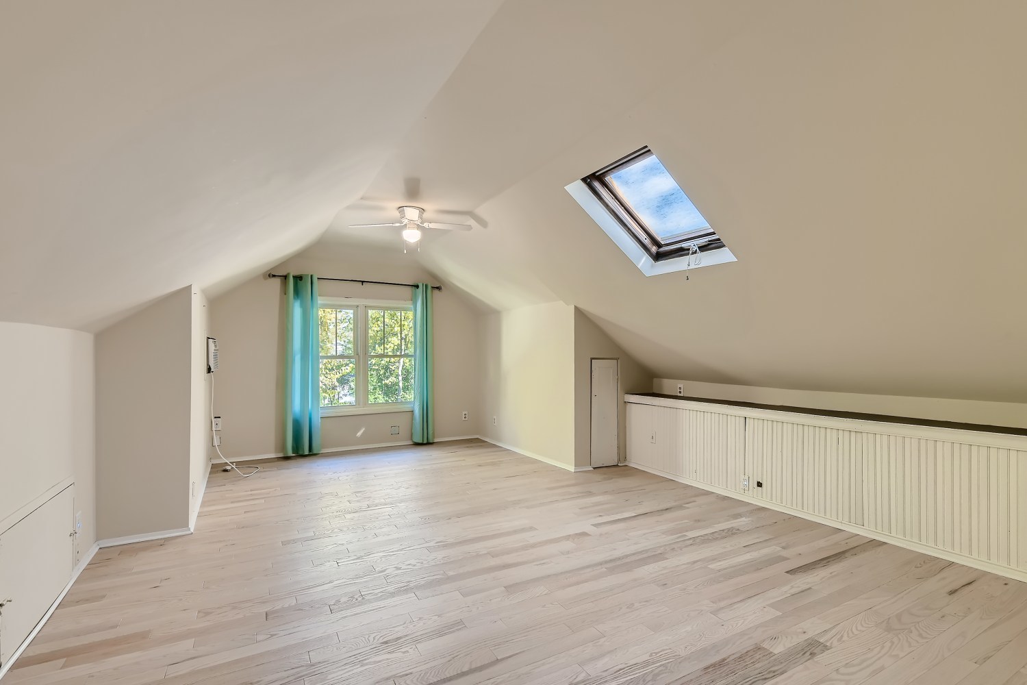 341 Nuttall Road Riverside, IL 60546 - Photo 18 of 28 a view of an empty room with a window and wooden floor