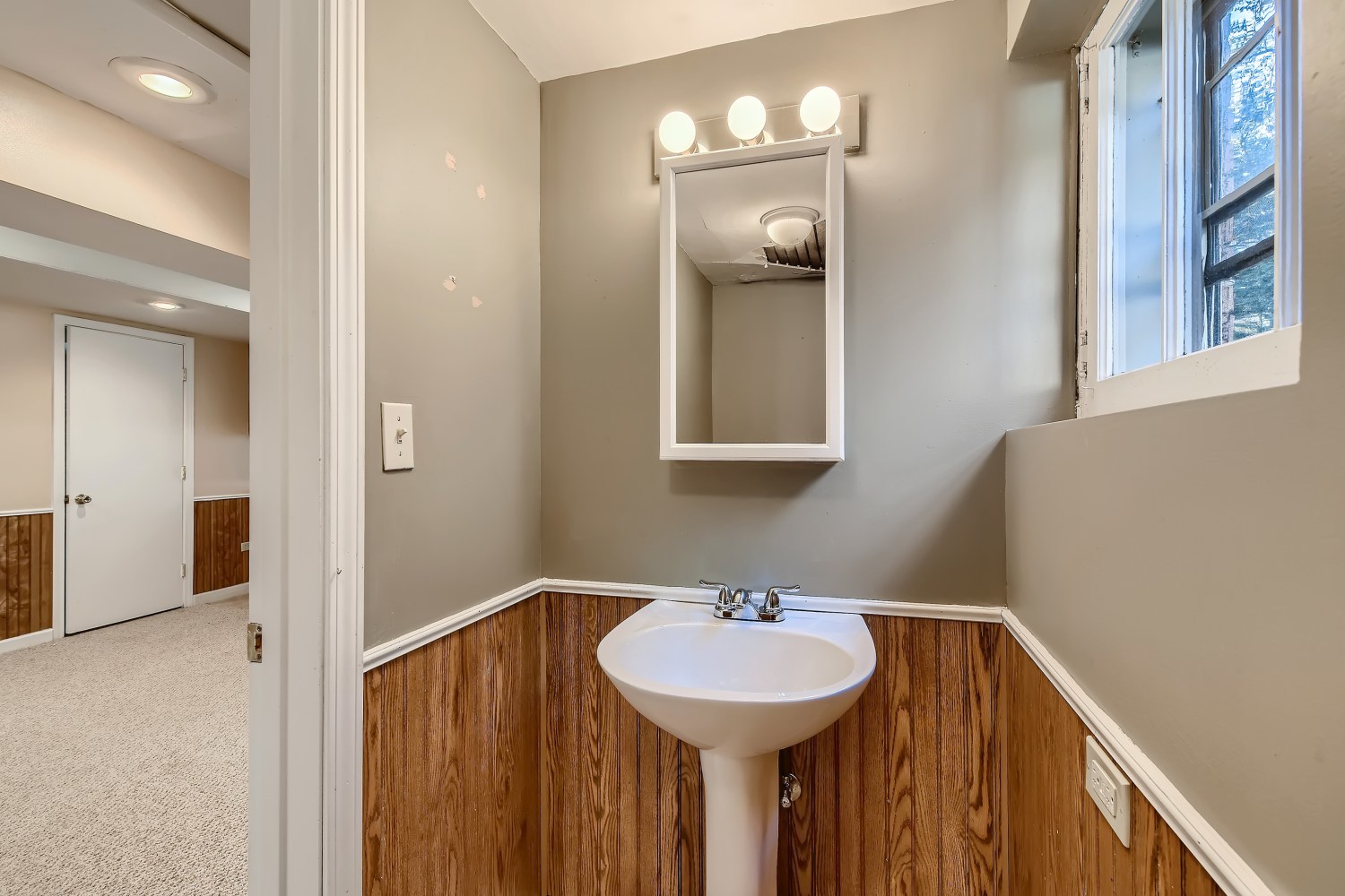 341 Nuttall Road Riverside, IL 60546 - Photo 22 of 28 a bathroom with a sink and a mirror