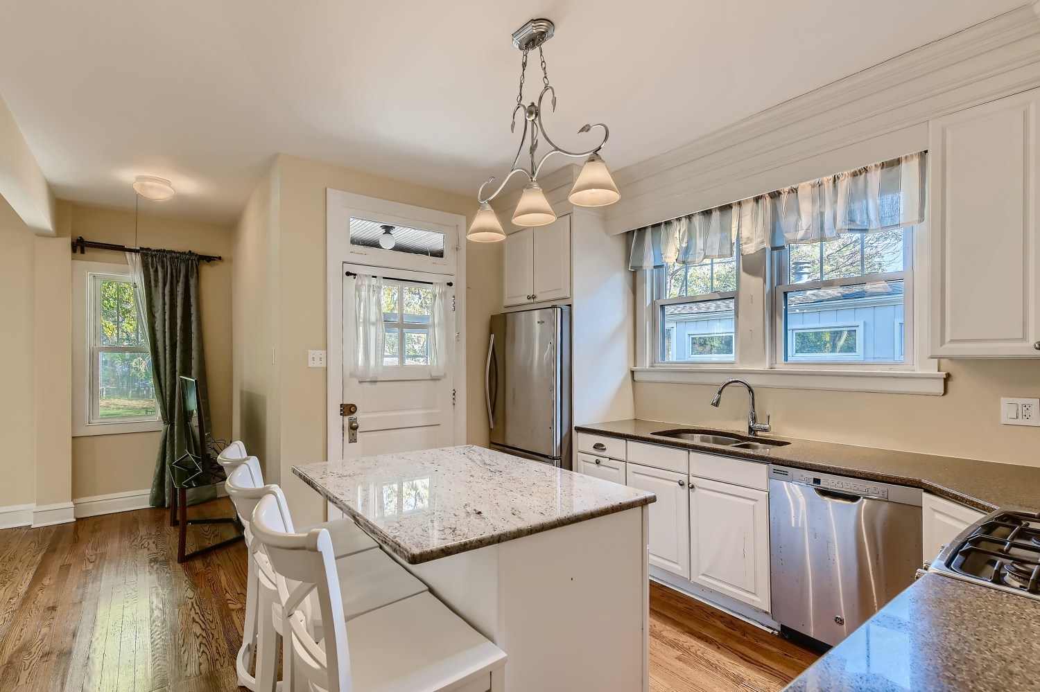 341 Nuttall Road Riverside, IL 60546 - Photo 7 of 28 a kitchen with sink refrigerator and window