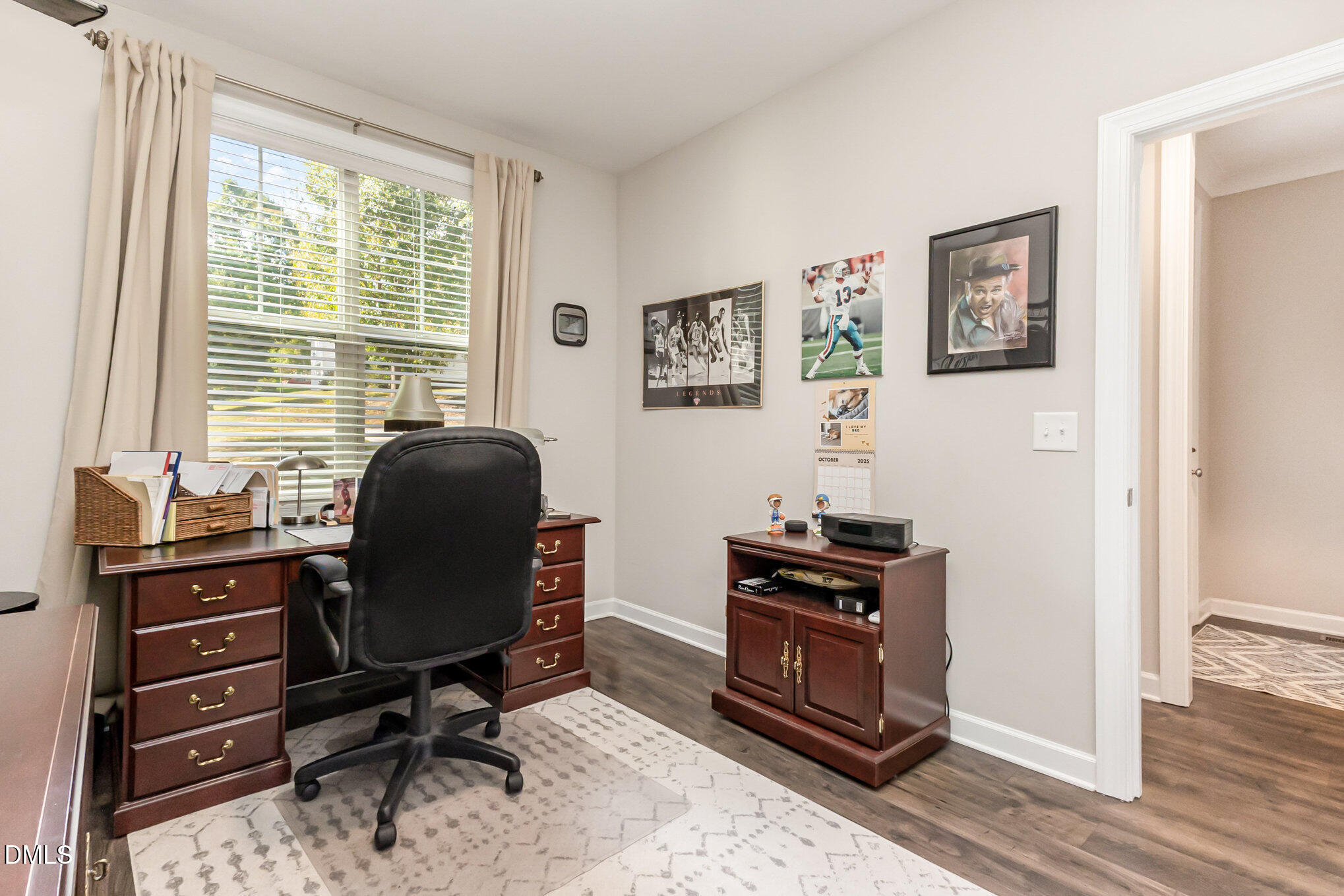 128 Waterleaf Place Clayton, NC 27527 - Photo 25 of 57 a view of a workspace with furniture and a window