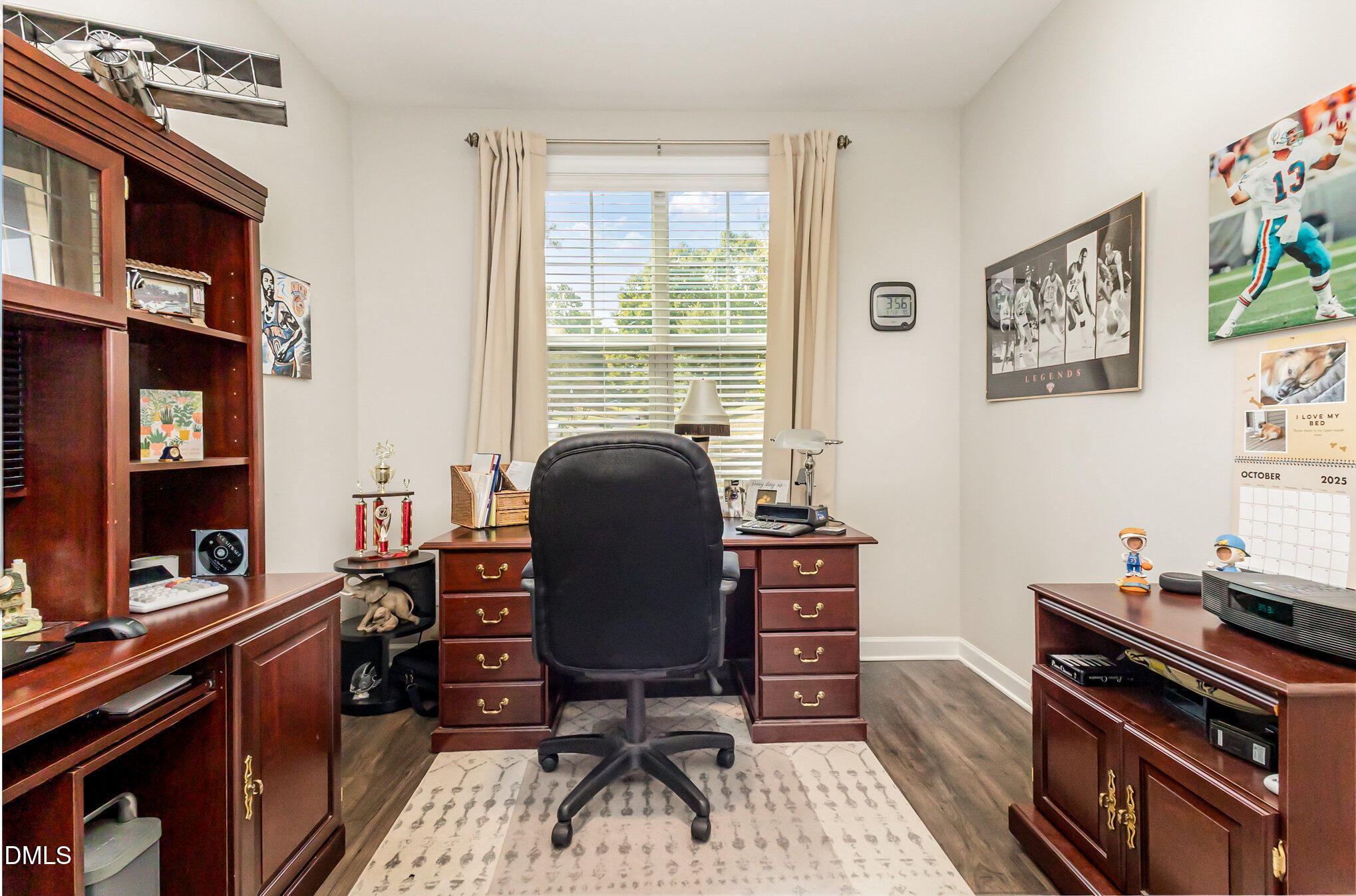 128 Waterleaf Place Clayton, NC 27527 - Photo 26 of 57 a view of a workspace with furniture and a window