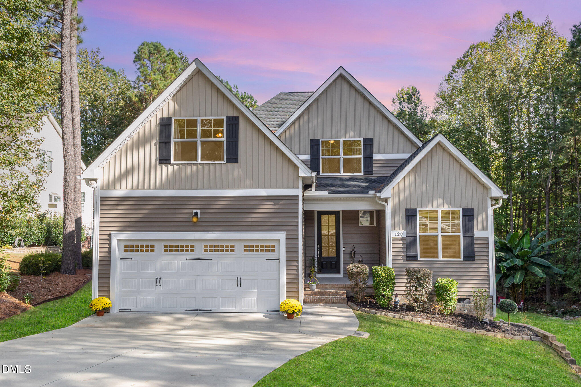 128 Waterleaf Place Clayton, NC 27527 - Photo 2 of 57 a view of a house with a yard