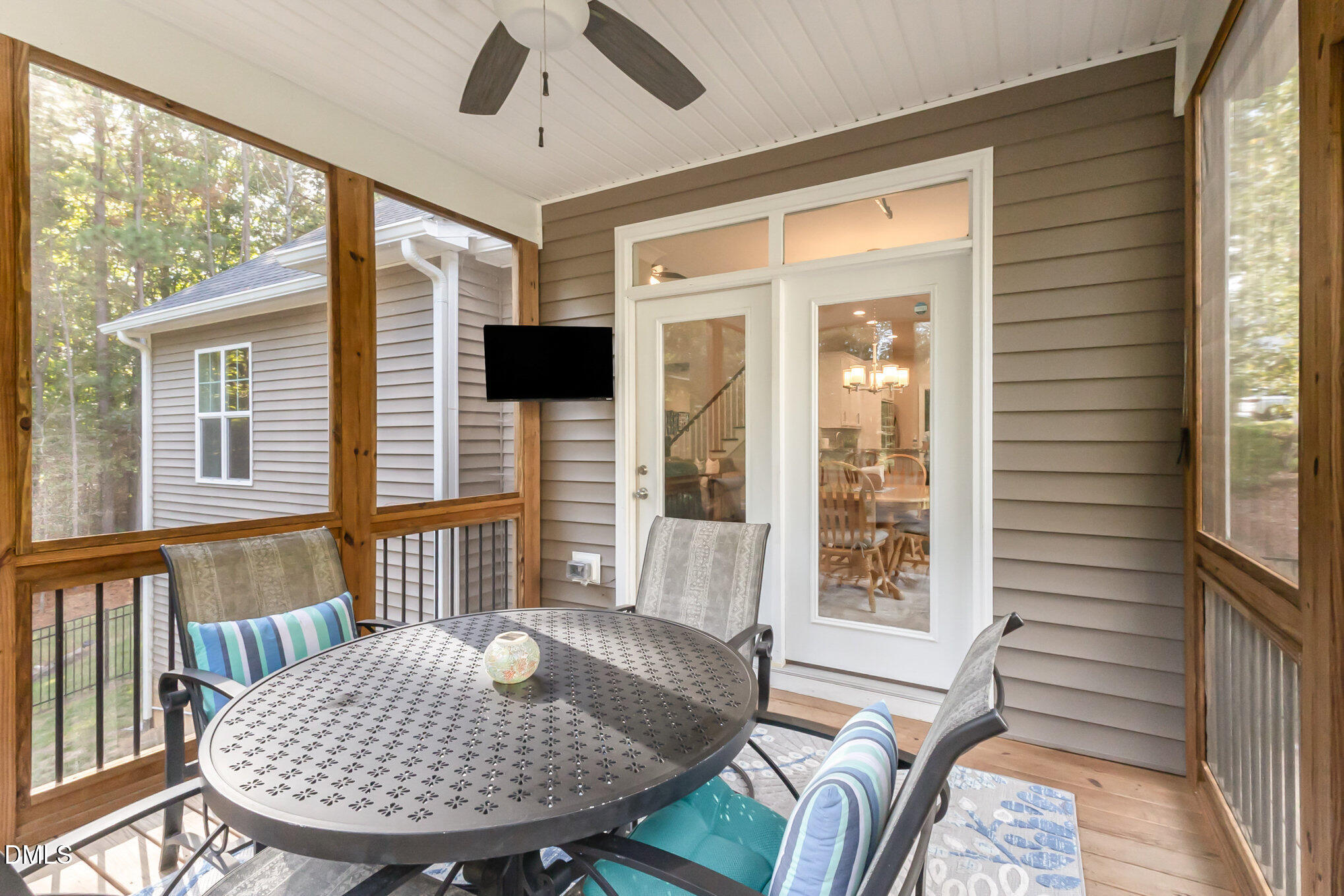 128 Waterleaf Place Clayton, NC 27527 - Photo 36 of 57 a view of a dining room with furniture window and wooden floor