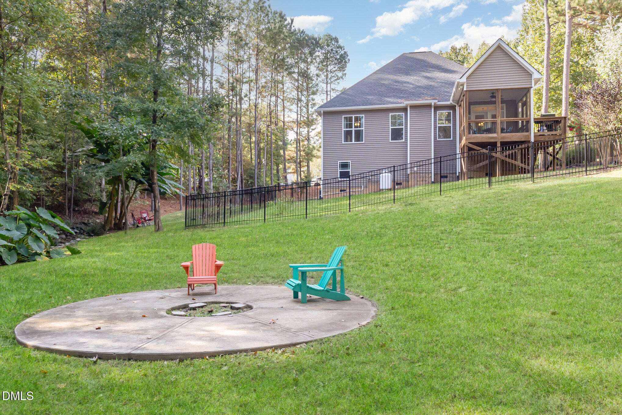 128 Waterleaf Place Clayton, NC 27527 - Photo 43 of 57 a view of a house with a backyard porch and sitting area