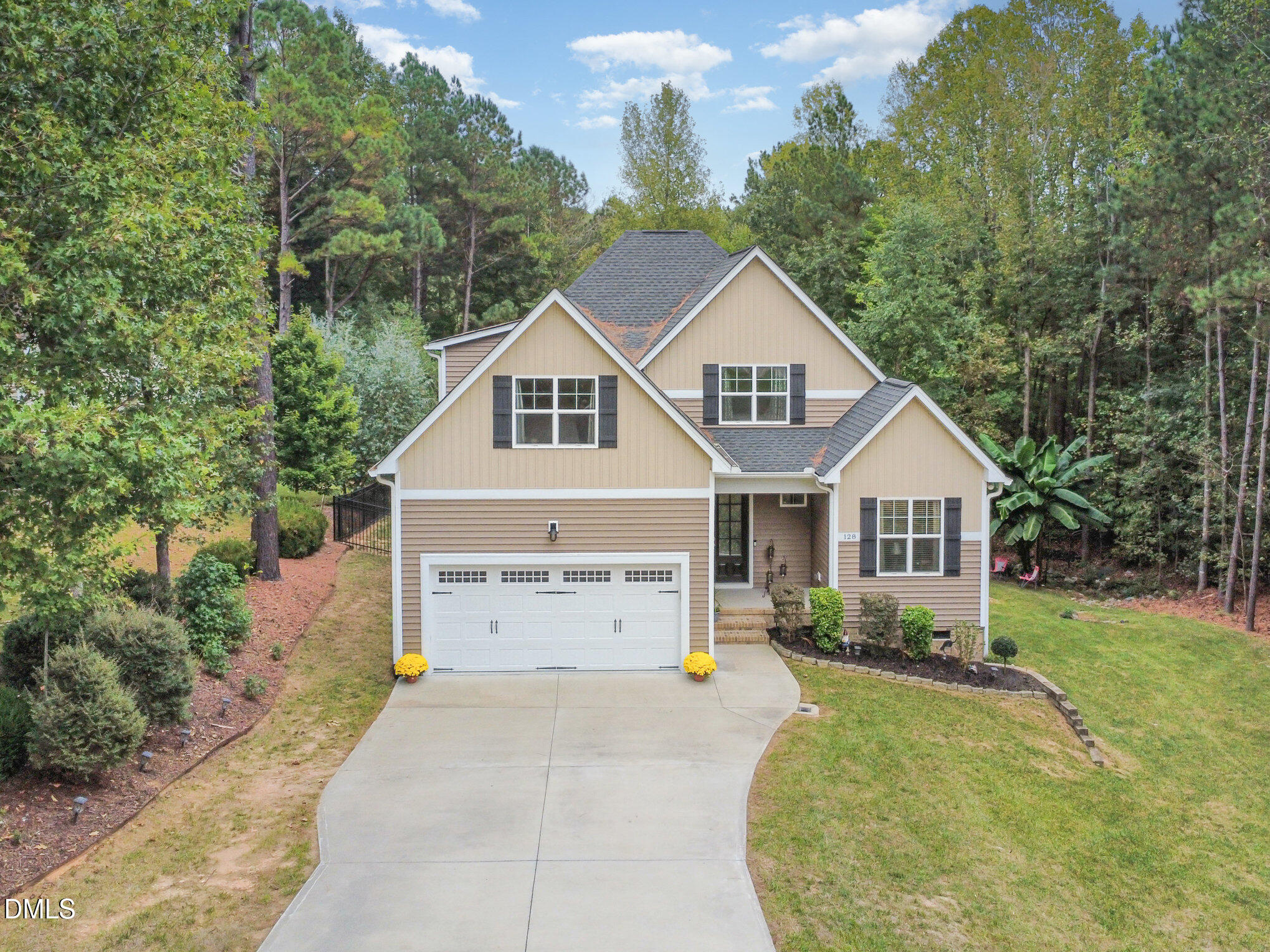 128 Waterleaf Place Clayton, NC 27527 - Photo 50 of 57 a view of a house with a yard