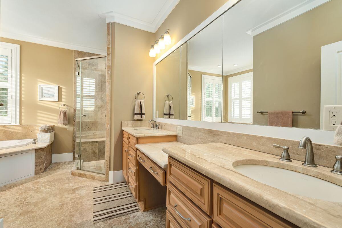 20 Sawgrass Lane Santa Rosa Beach, FL 32459 - Photo 12 of 25 a spacious bathroom with sinks mirror and a bathtub